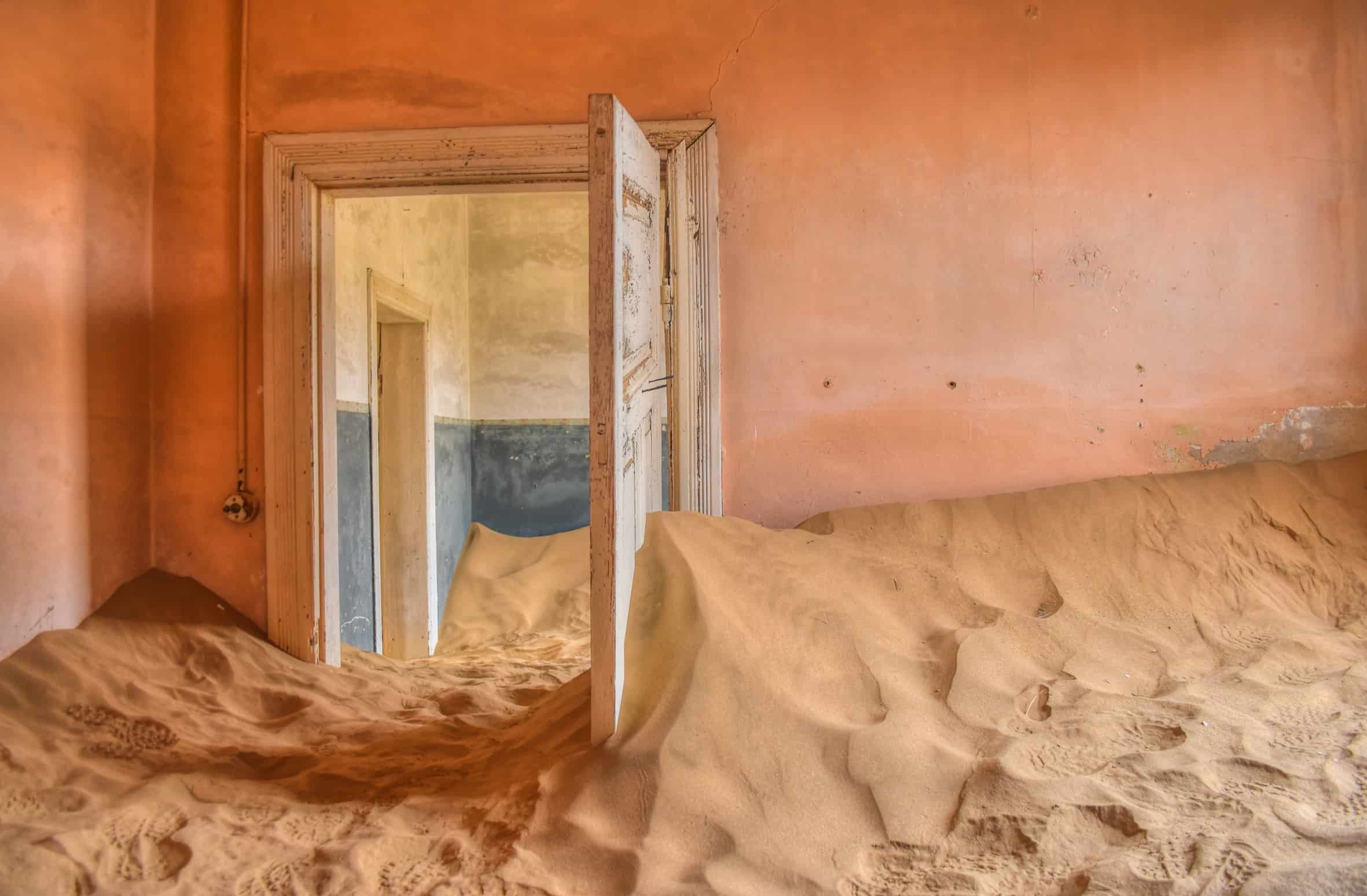 Kolmanskop namibia abandoned sand building door