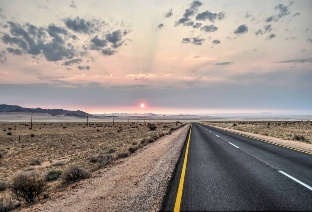 road desert namibia trip travel sunset