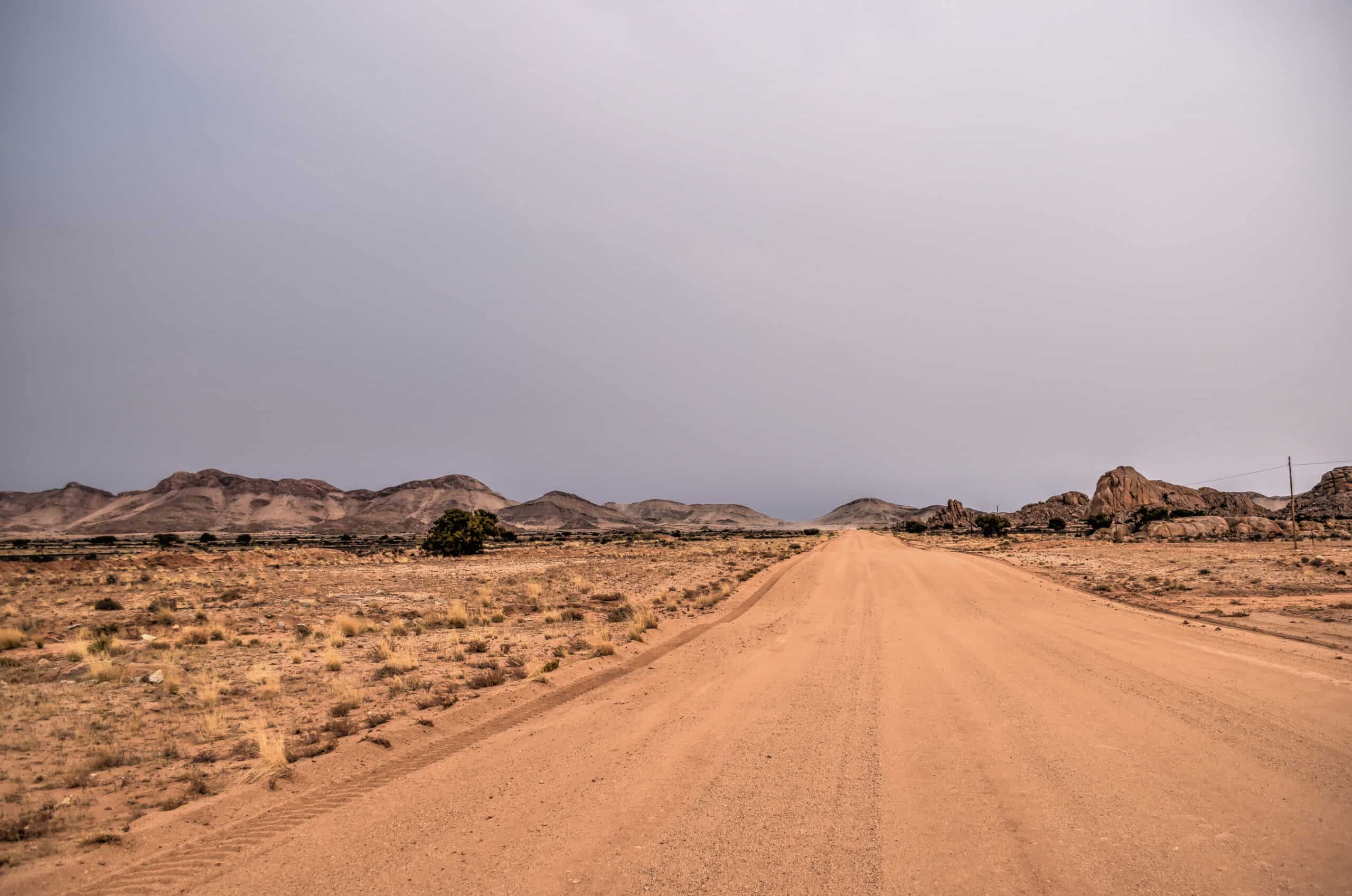 dirt road trip driving namibia travel desert landscape