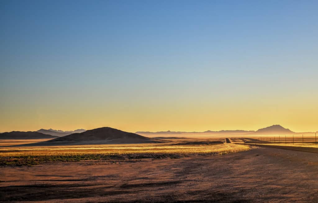 driving namibia travel desert landscape sunrise