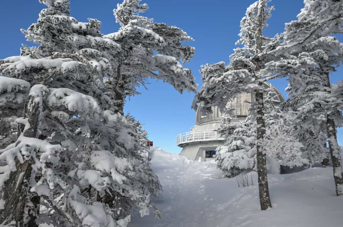 observatory on mont mégantic summit with frozen trees