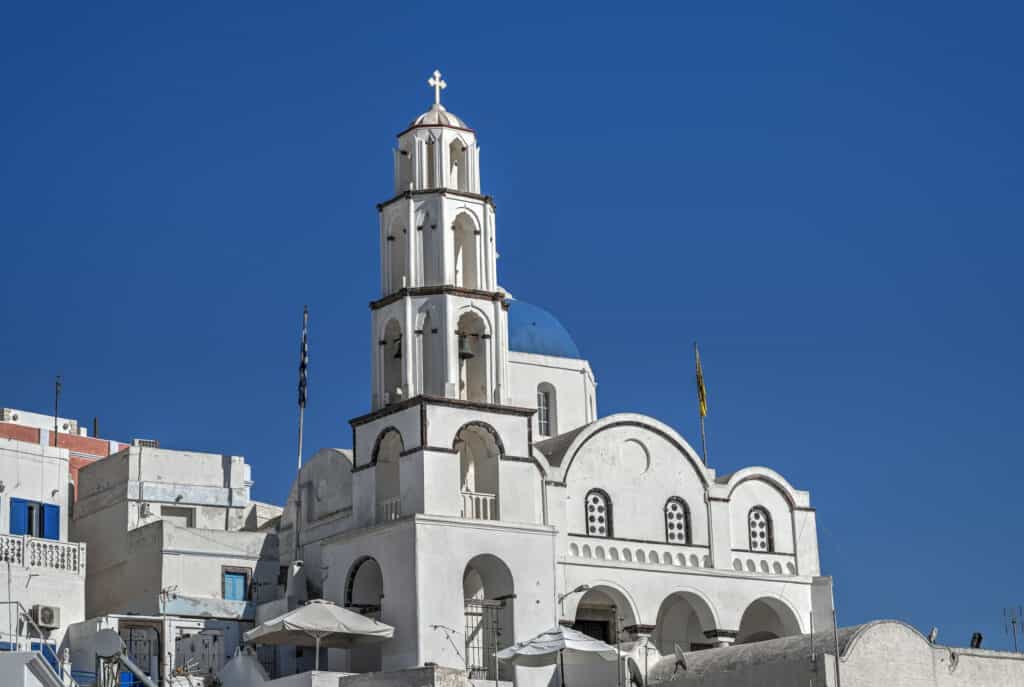 blue dome church and bells in pyrgos santorini