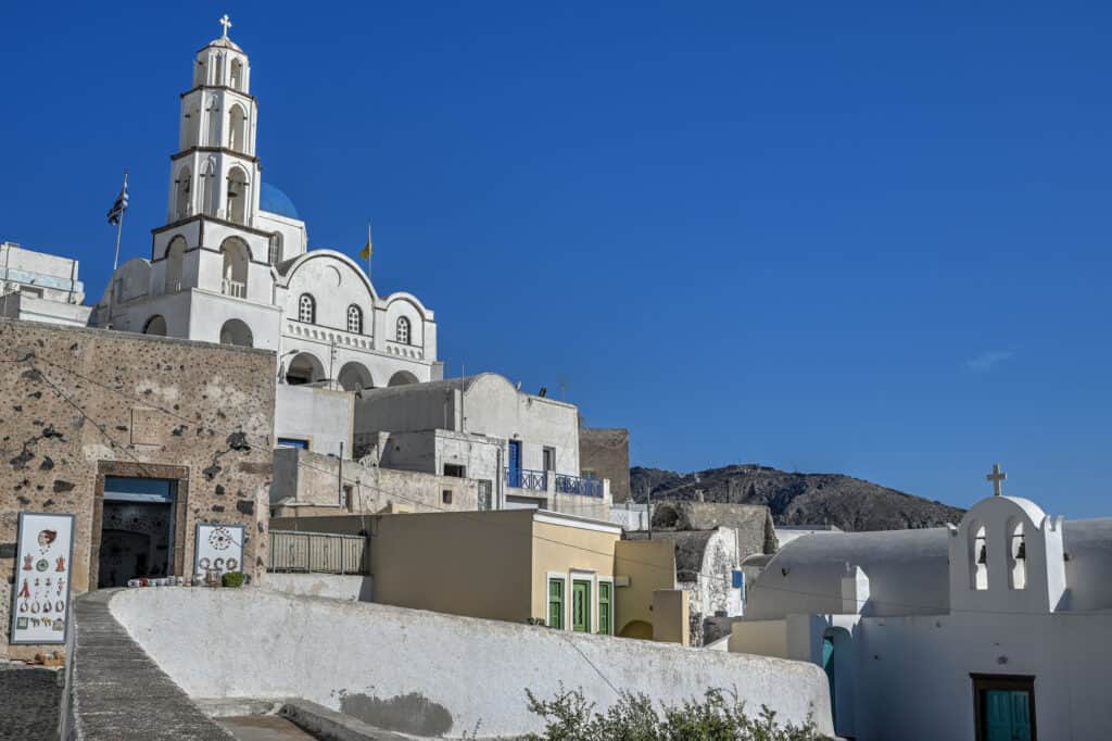 blue dome church and bells in pyrgos santorini