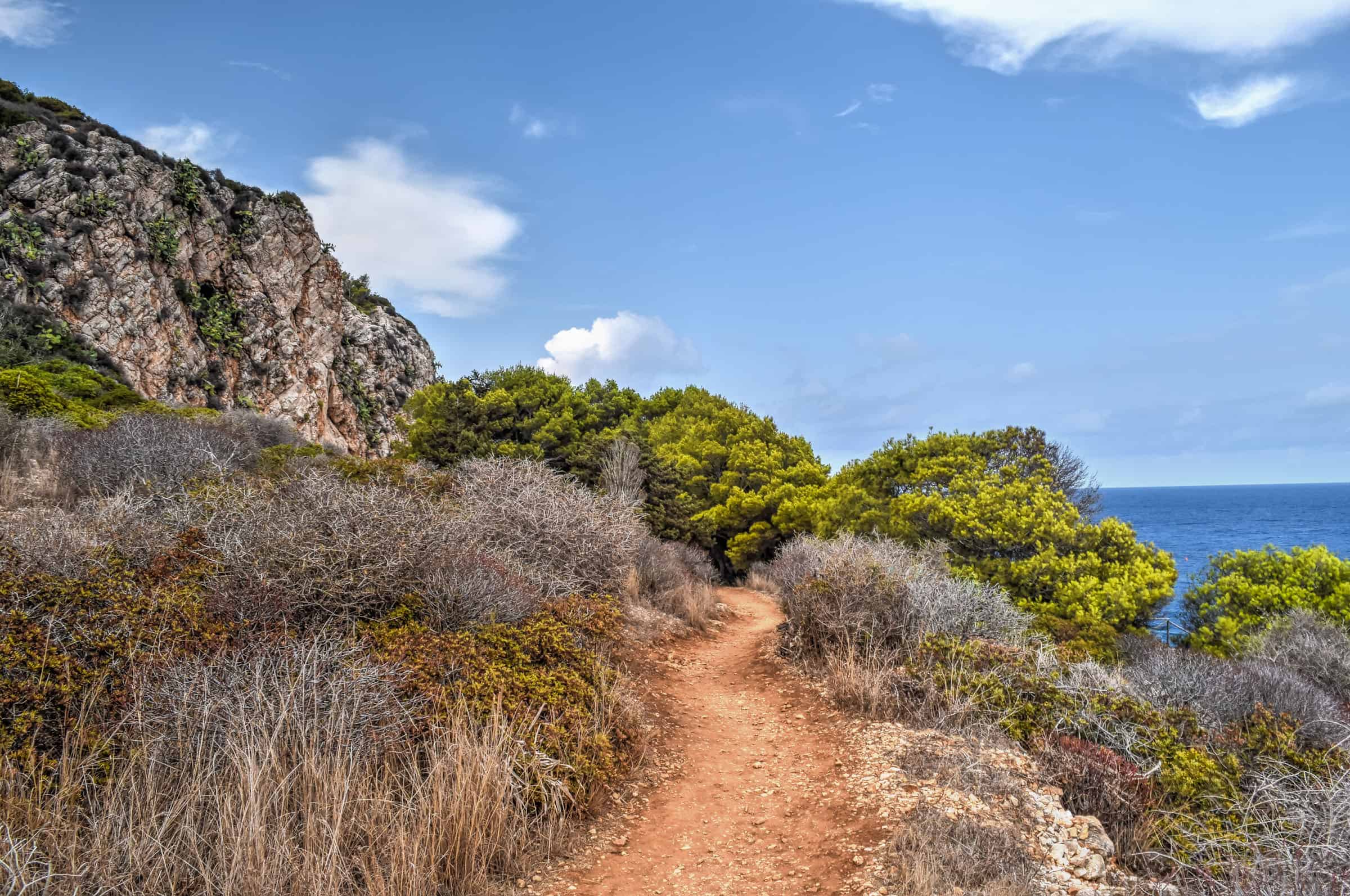 hiking the coastal trail in levanzo