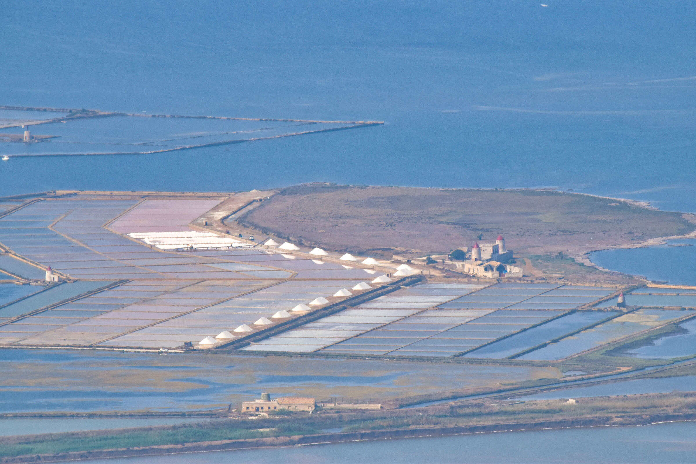 view of trapani salt flats and windmills from erice