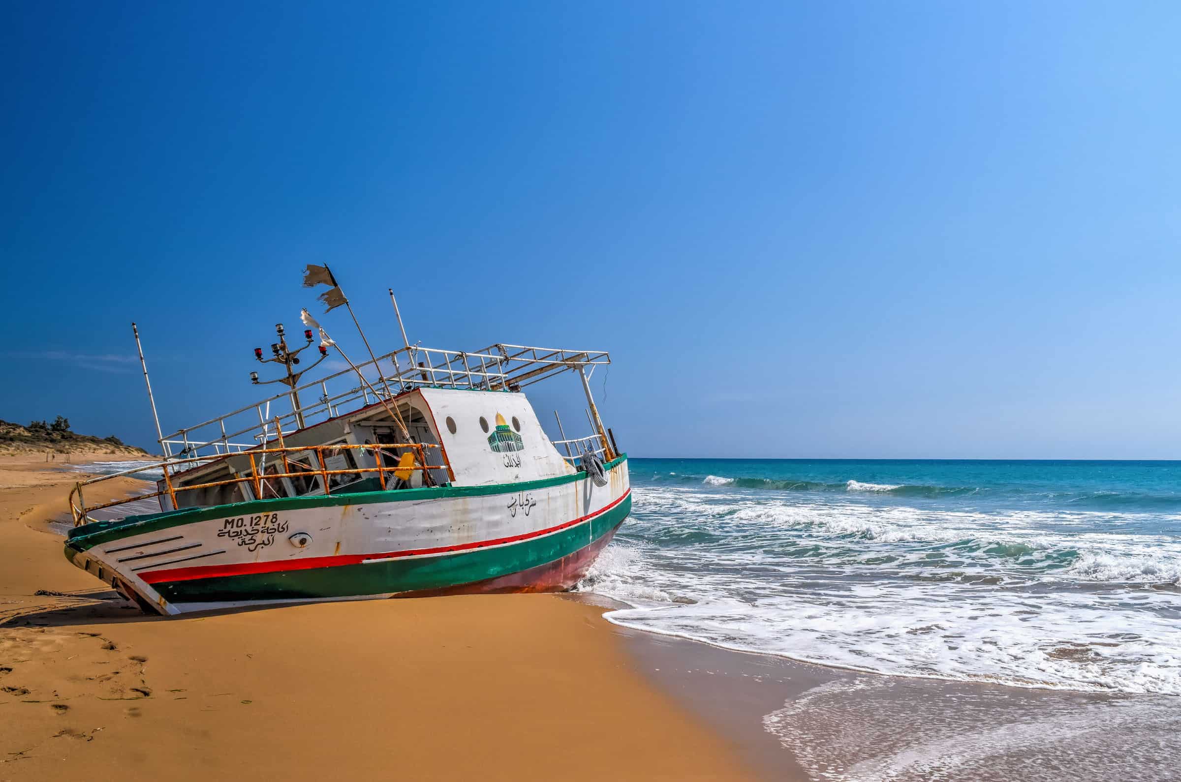 boat beached in torre salsa, sicily