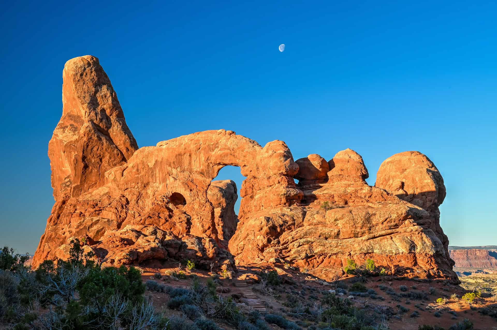 moon rising over turret arch