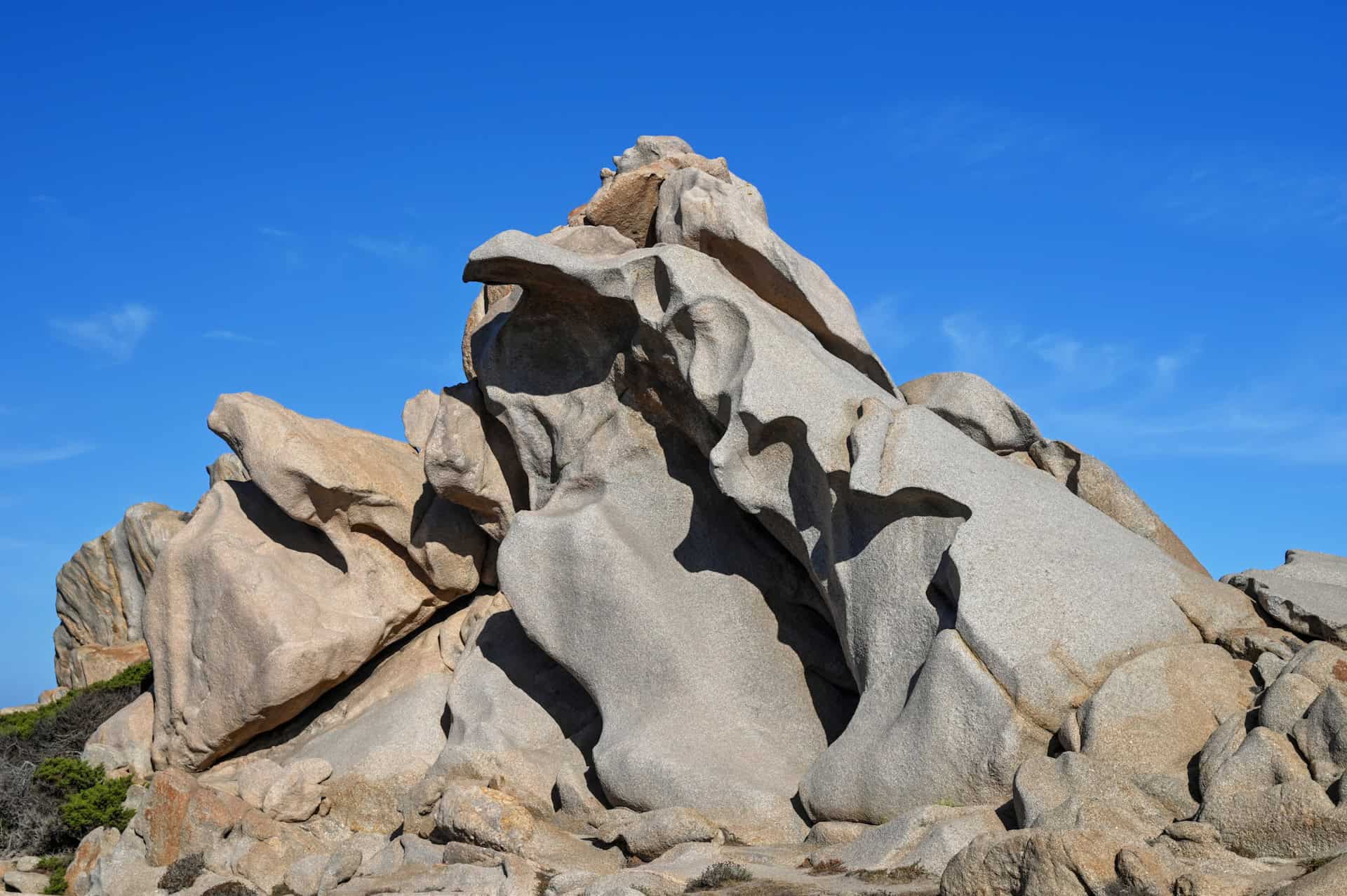 wind swept otherwordly rock formation of capo testa